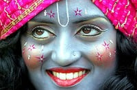 girl dressed as krishna.jpg