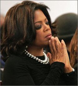 Oprah praying.jpg