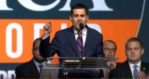 Russell Moore answering criticisms of his policies at the SBC convention.