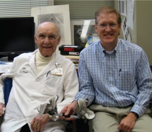Dr. Ponseti, left, and John Mitchell.