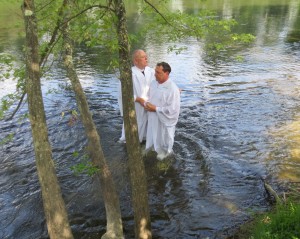 Paul Hamilton baptizes Chris