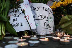 epa05984816 Tributes at a vigil for the people who lost their lives during the Manchester terror attack in central Manchester, Britain, 23 May 2017. Photo Credit: EPA/ANDY RAIN