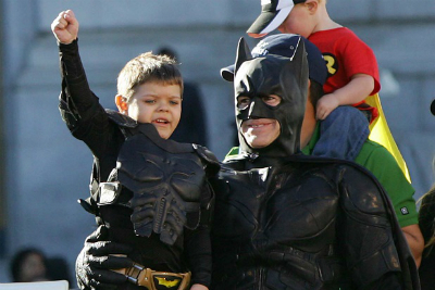 Miles Scott (Batkid) and Eric Johnston (Batman) save the day. (Warner Bros.)