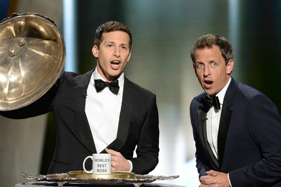 Andy Sandberg and Seth Myers honor  Lorne Michaels, with a “World’s Best Boss” coffee mug during the 67th Annual Emmy Awards. (FOX)