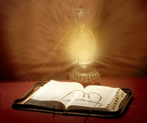 open Bible with reading glasses and hurricane lamp inspirational photo by Steve Henderson Fine Art