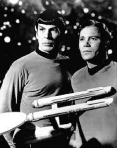 Spock and Captain Kirk in their Federation suits, in the original Star Trek series. (Image sourced via google images). 
