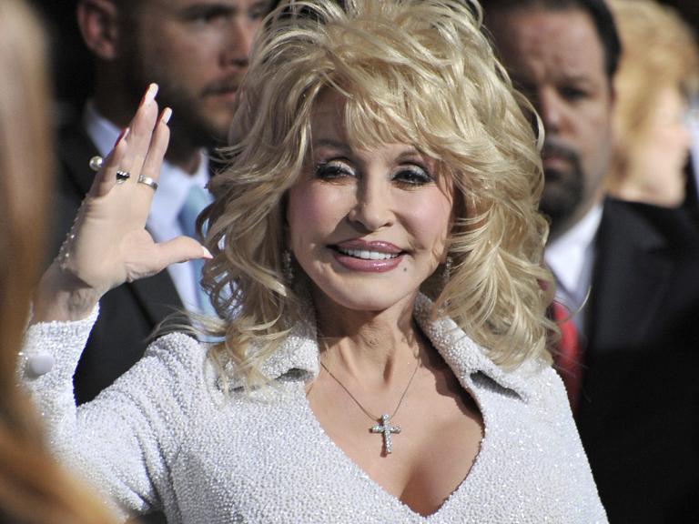 How Dolly Parton Continues To Honor Her Family's Name