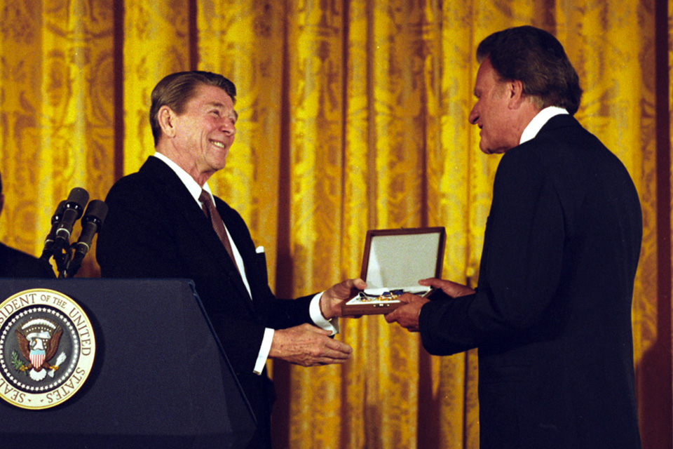 President Ronald Reagan presenting Rev. Billy Graham with the Presidential Medal of Freedom