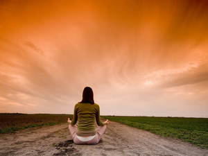 meditation woman orange sky.jpg